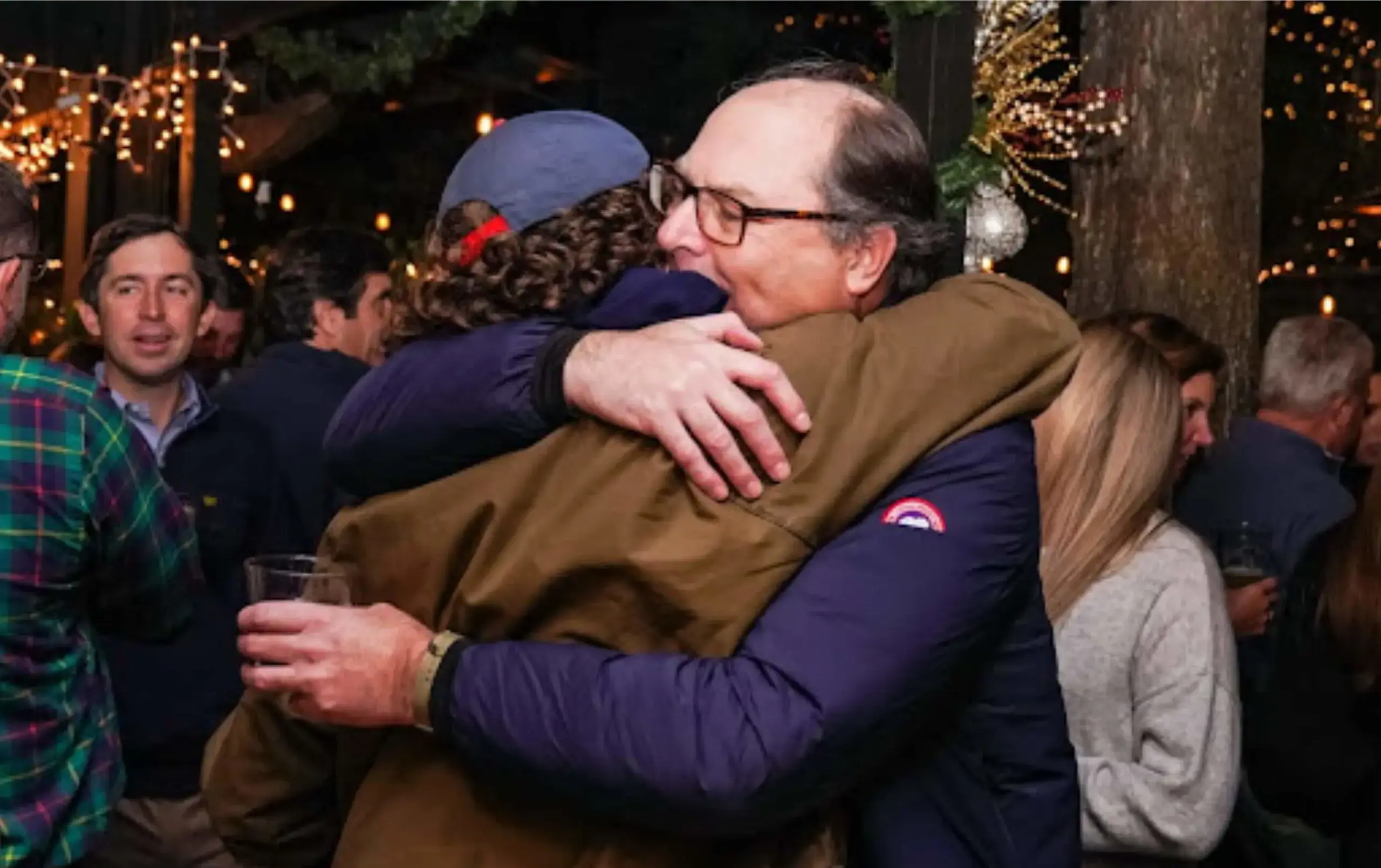 Porter-Gaud Alumni hugging at a reunion