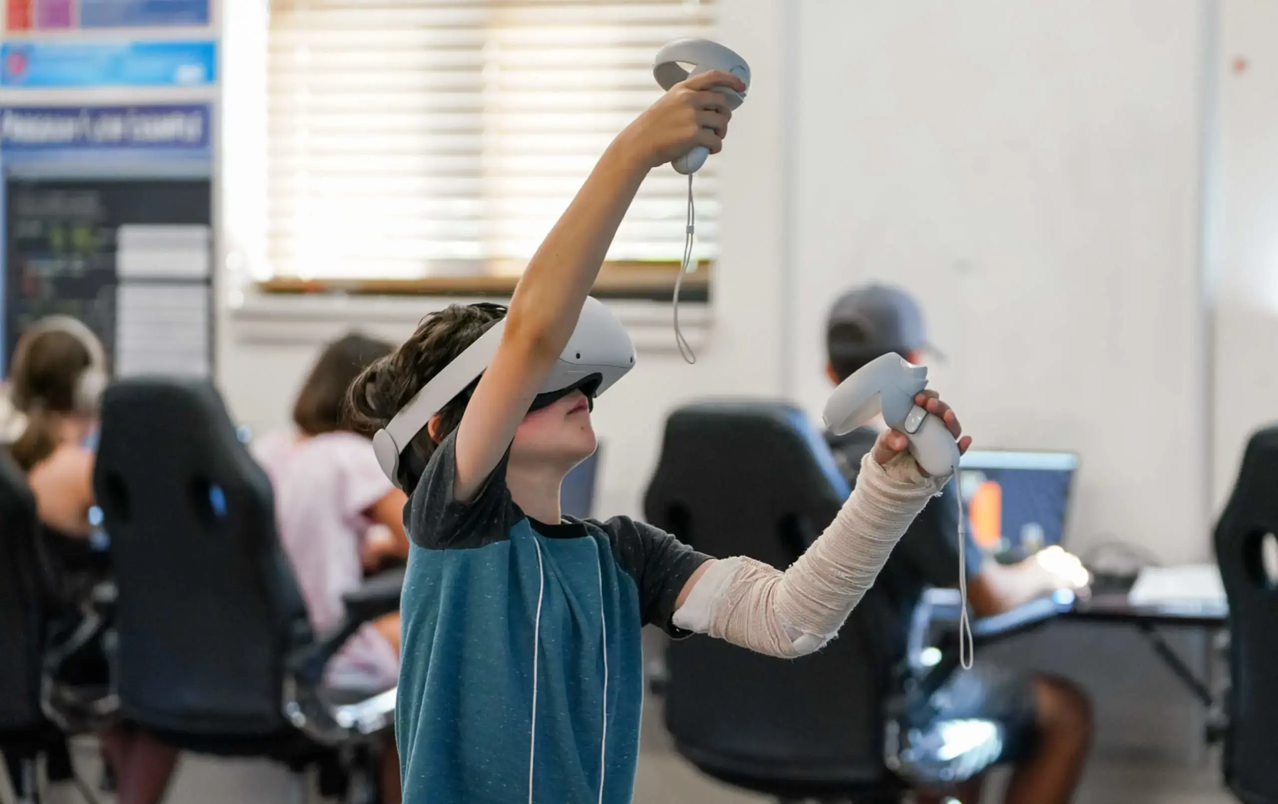 Camp Cyclone student explores with VR headset