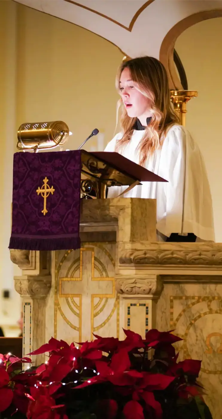 Porter-Gaud student gives a reading in a chapel service